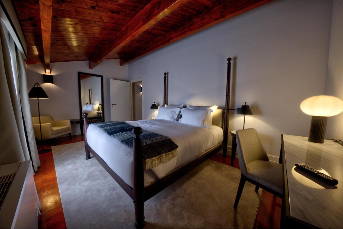 Uma cama ou camas num quarto em Octant Lousa