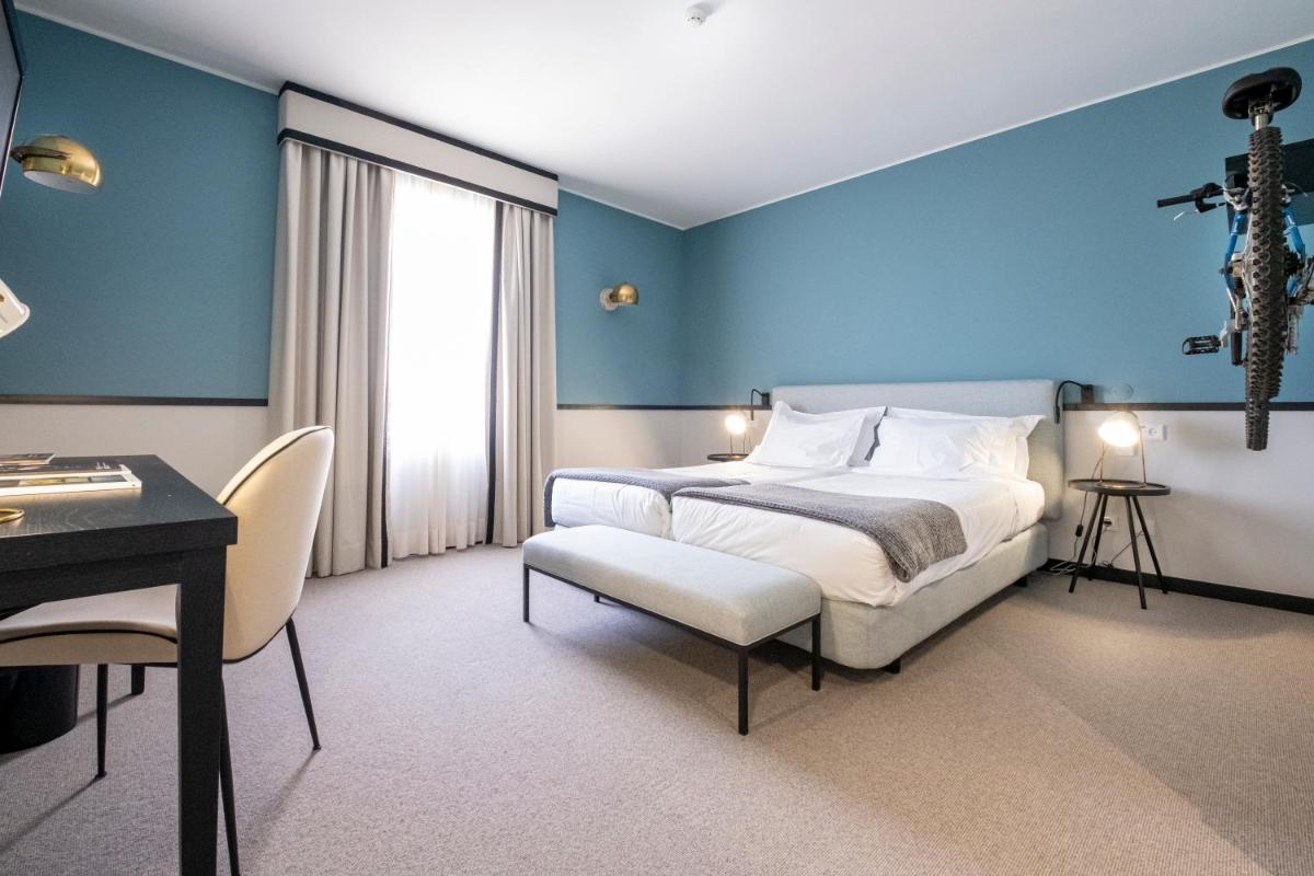 Uma cama ou camas num quarto em Octant Lousa