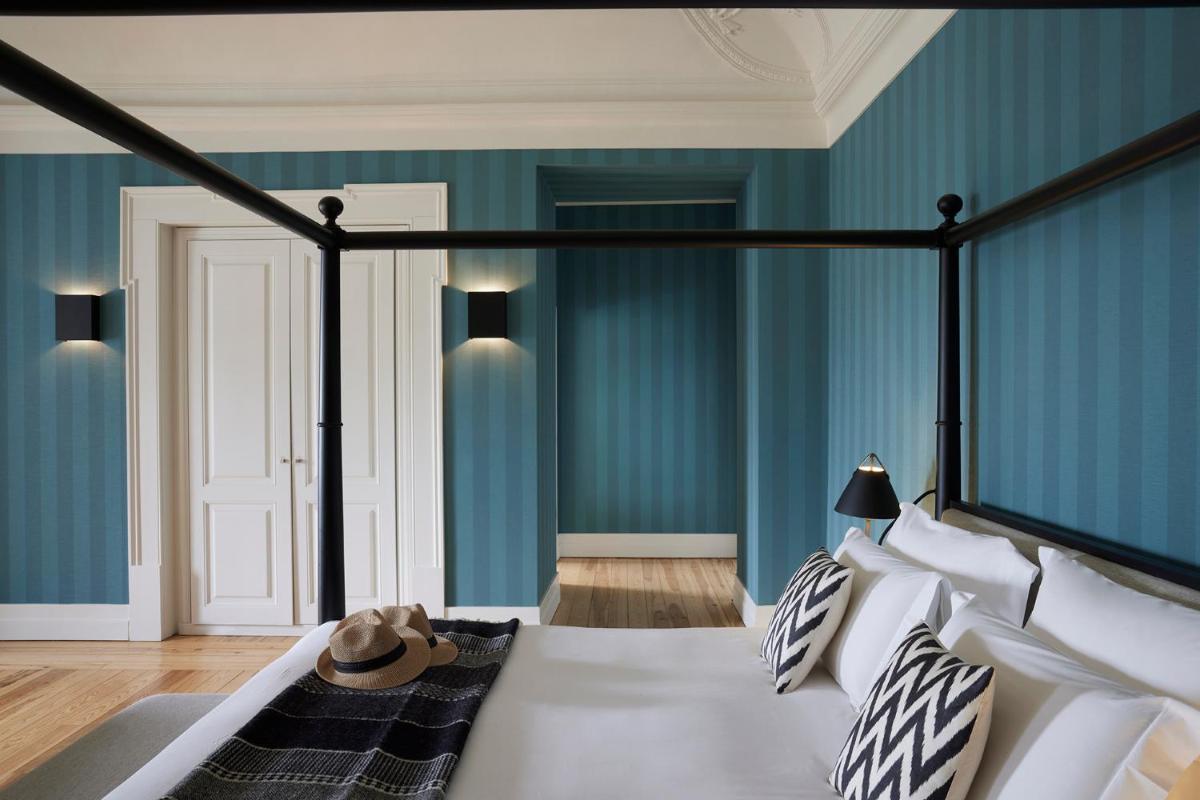 Uma cama ou camas num quarto em Octant Lousa