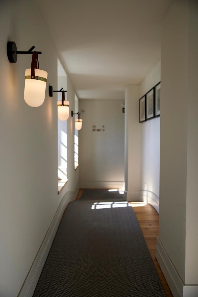 Uma cama ou camas num quarto em Octant Lousa