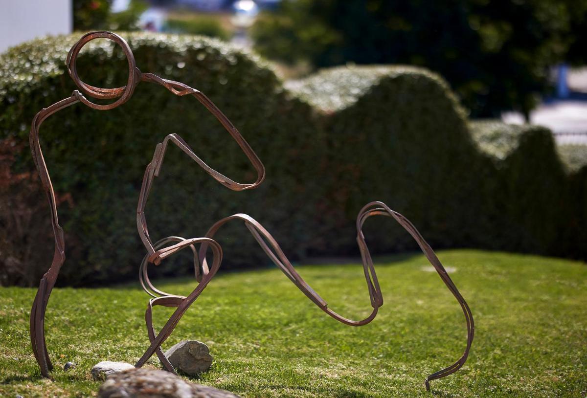 Um jardim no exterior de Octant Lousa