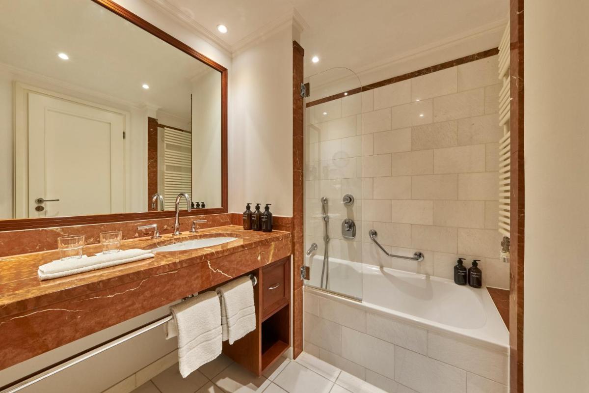 Ein Badezimmer in der Unterkunft Maison Messmer - ein Mitglied der Hommage Luxury Hotels Collection
