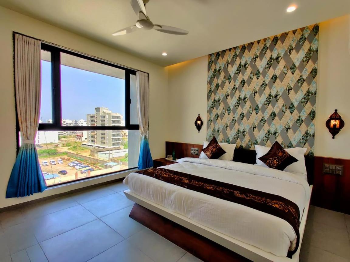 The White Orchid Hotel in Junagadh - Housity