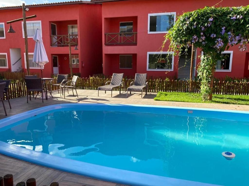 Village Ecoville das Mangueiras fica a 3km da praia de Guarajuba - Housity