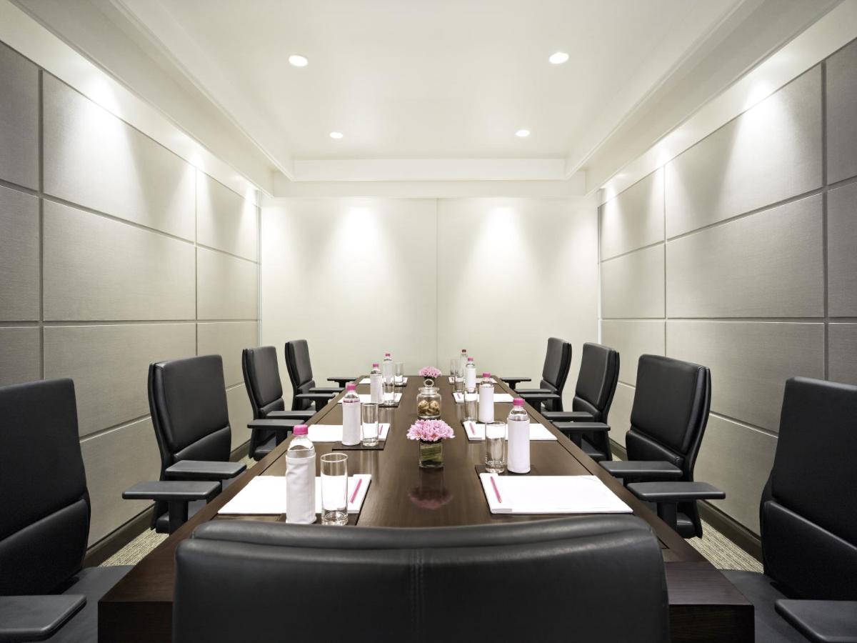 a conference room with a long table and chairs at President - IHCL SeleQtions in Mumbai