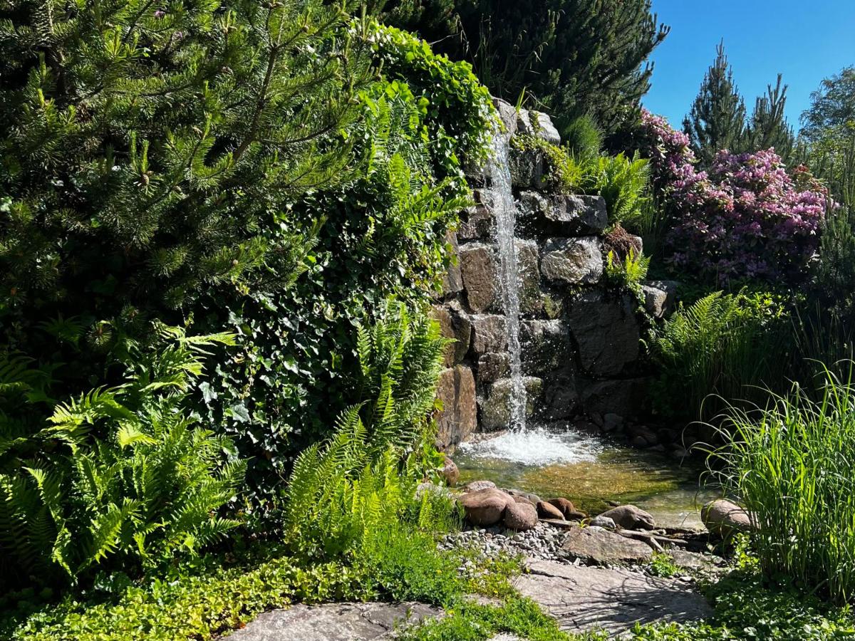Ein Garten an der Unterkunft Wellness & Genuss Resort - Engel Obertal