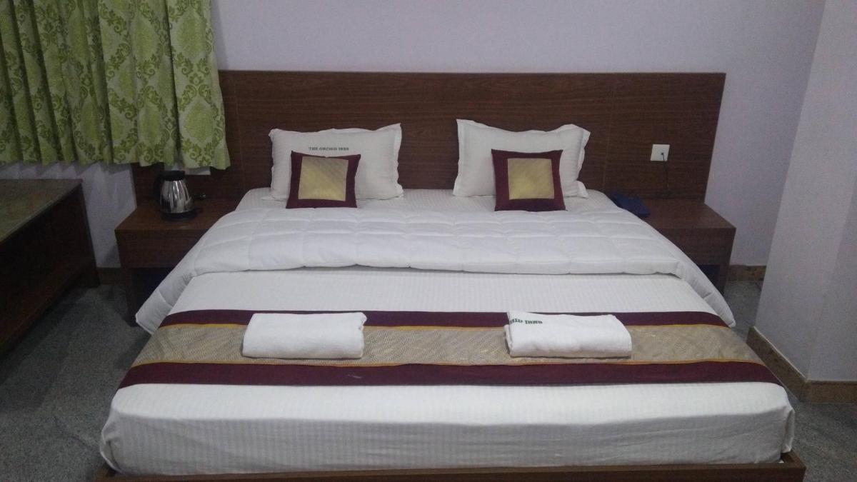 THE ORCHID INNS THENI - Housity