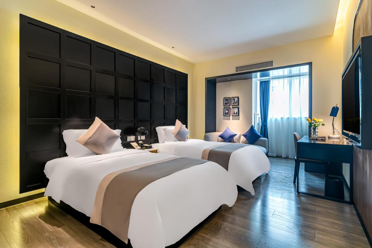 Empathy Hotel - Guangzhou East Railway Station Tianhe Sports Center - Housity