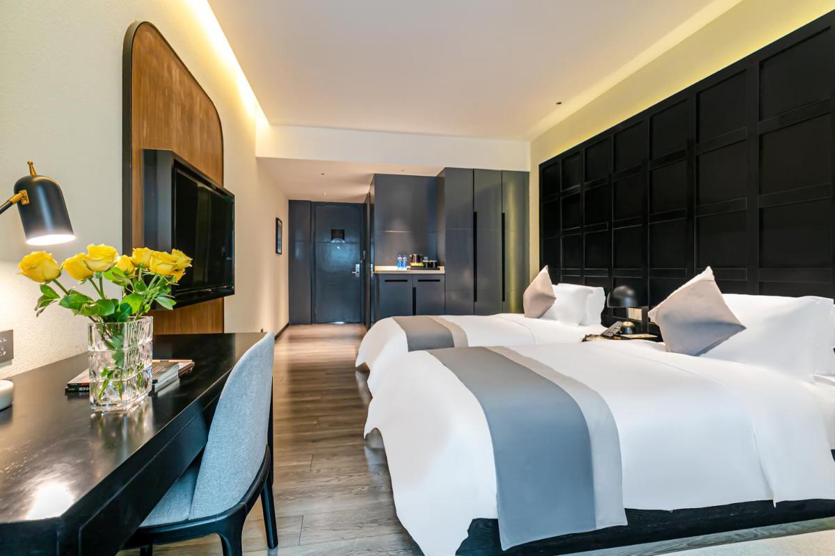 Empathy Hotel - Guangzhou East Railway Station Tianhe Sports Center - Housity