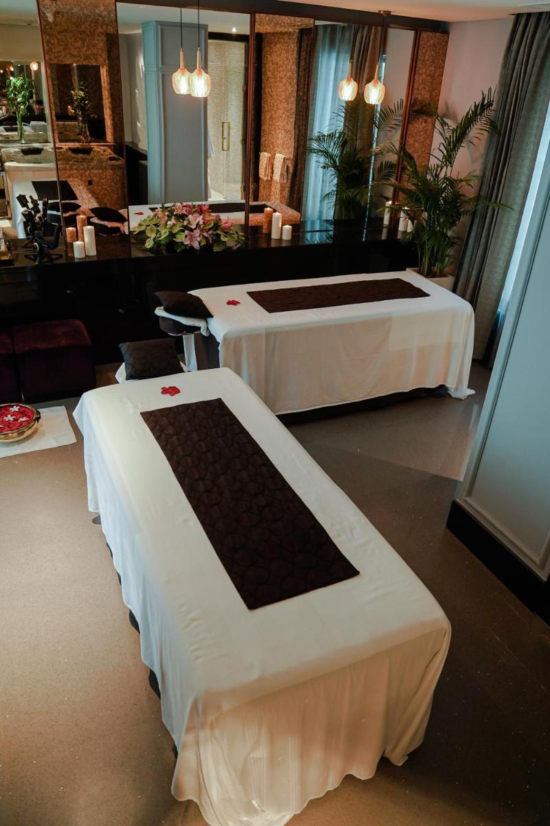 a room with two beds in a room with at Crowne Plaza Today Gurugram by IHG in Gurgaon