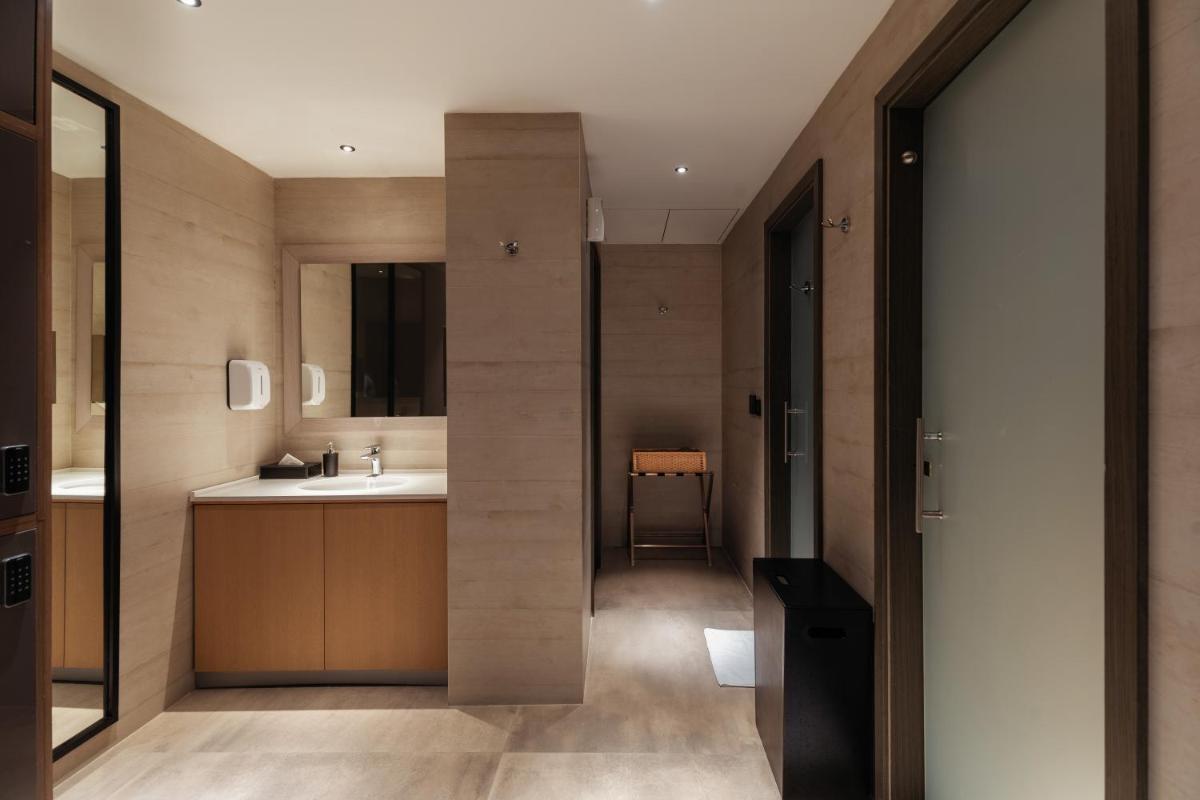 a bathroom with a sink and a mirror at Parallel Hotel Udaipur, a member of Radisson Individuals in Udaipur