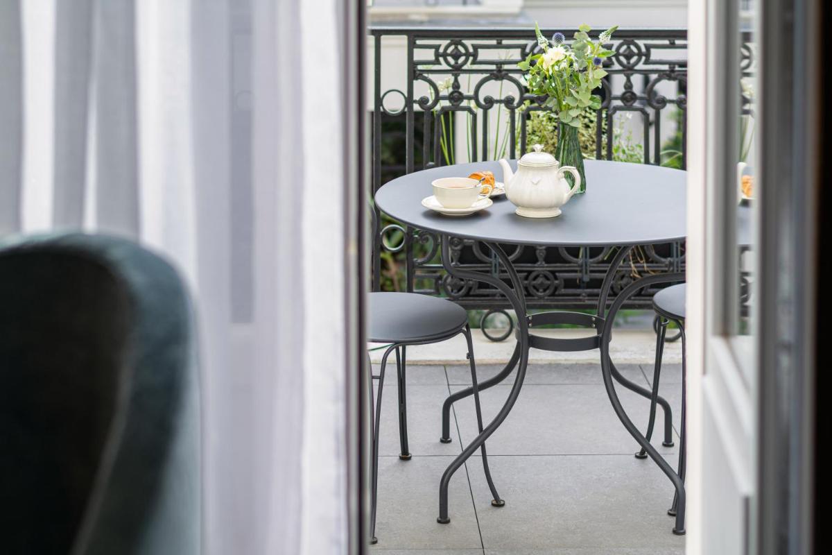 Balcon ou terrasse dans l'établissement Hôtel & SPA Napoléon