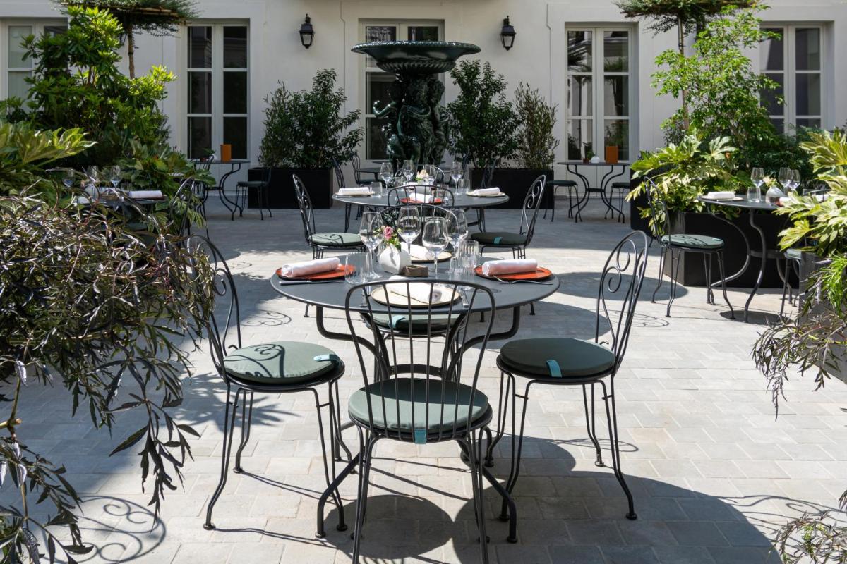 Restaurant ou autre lieu de restauration dans l'établissement Hôtel & SPA Napoléon