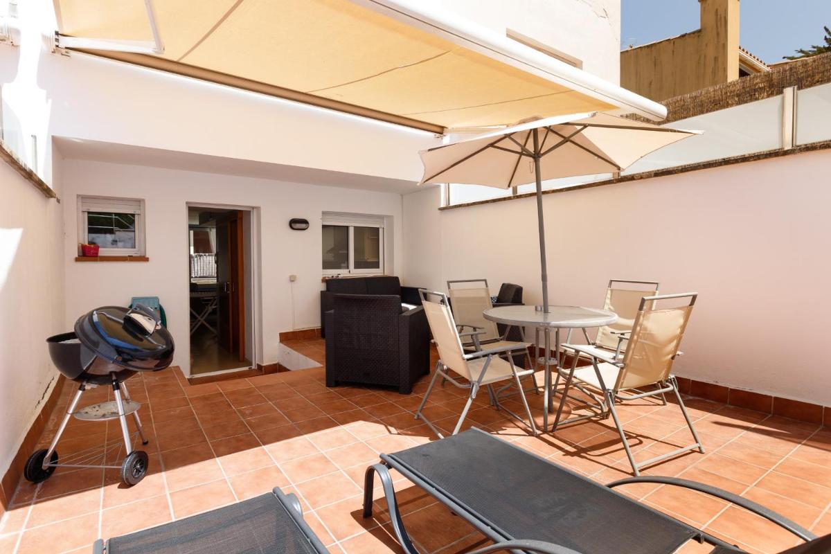 Lets Holidays Big terrace house with parking - Housity