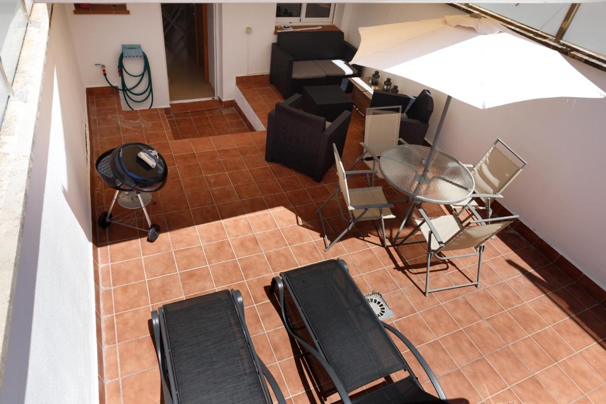Lets Holidays Big terrace house with parking - Housity