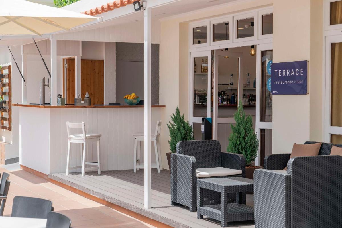 Uma área de estar em Dorisol Mimosa Studio Hotel