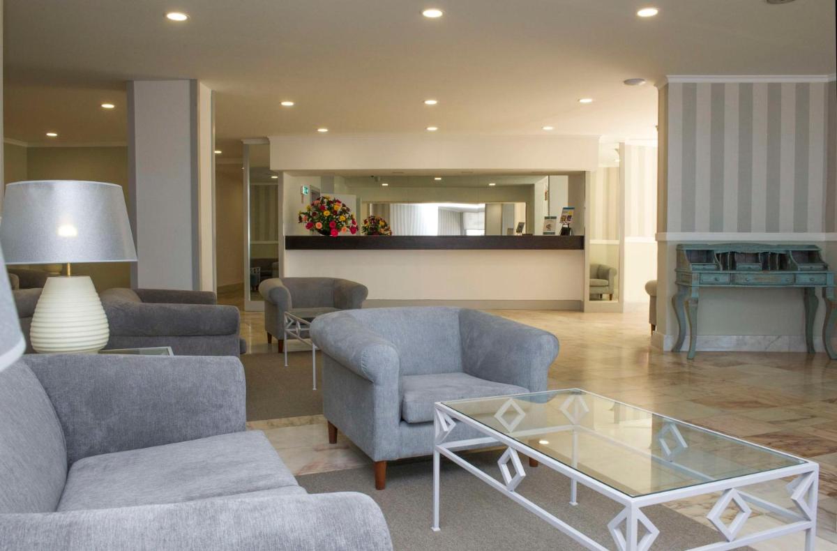 Uma área de estar em Florasol Residence Hotel - Dorisol hotels