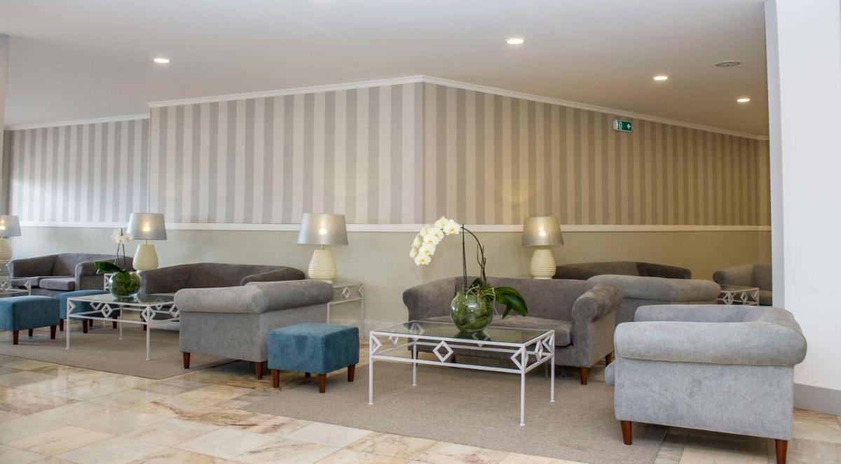 Uma área de estar em Florasol Residence Hotel - Dorisol hotels
