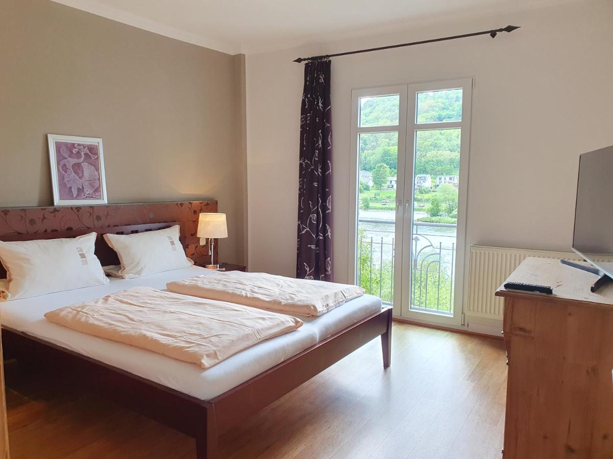 Exklusive Ferienwohnungen Ferienhaus Inselblick in Traumlage mit Balkon und Panoramablick - Housity