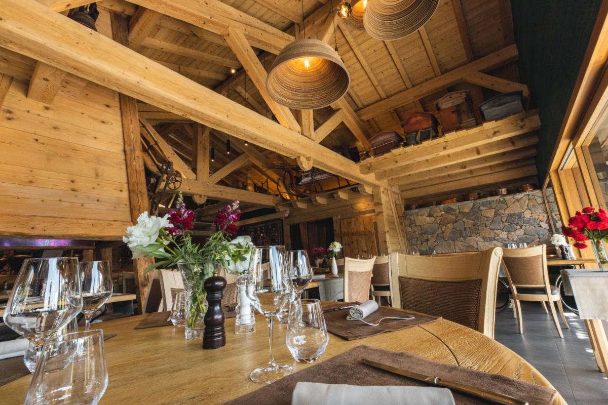 Restaurant ou autre lieu de restauration dans l'établissement Les Gentianettes Hotel & Spa