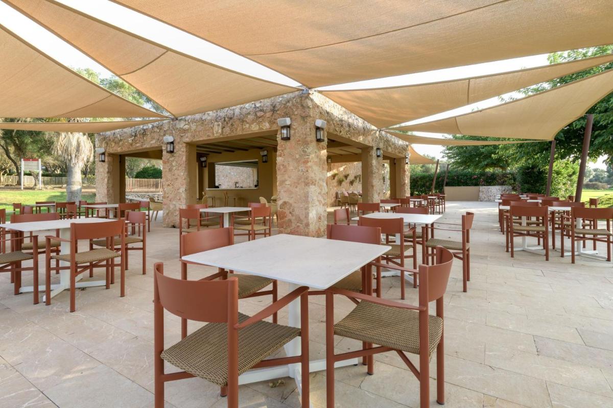 Un restaurante o sitio para comer en Hacienda Son Antem Golf Resort, Autograph Collection