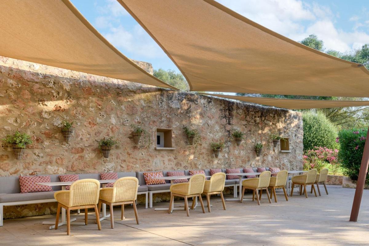 Un restaurante o sitio para comer en Hacienda Son Antem Golf Resort, Autograph Collection