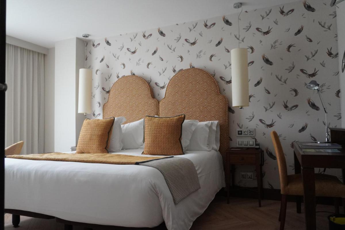 Cama o camas de una habitación en ARTIEM Asturias