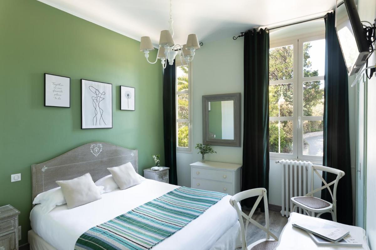 Un ou plusieurs lits dans un hébergement de l'établissement La Solenzara hôtel - 3 Etoiles Supérieur - Appartement & SPA