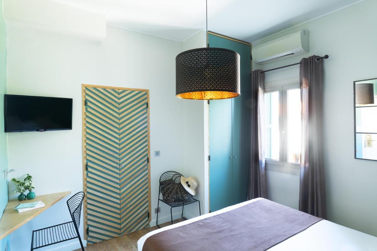 Un ou plusieurs lits dans un hébergement de l'établissement La Solenzara hôtel - 3 Etoiles Supérieur - Appartement & SPA