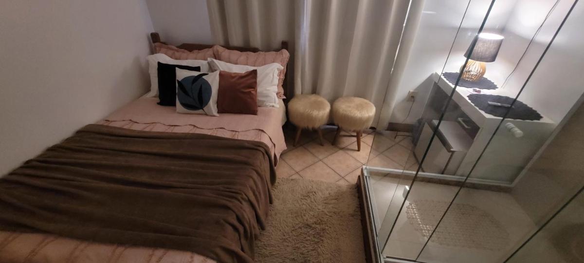 Banheiro de Vidro em Suíte compacta.Centro - Housity