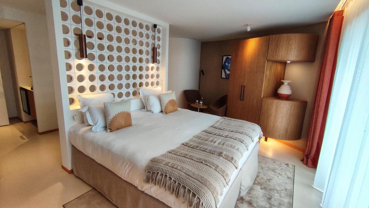 Un ou plusieurs lits dans un hébergement de l'établissement Hôtel La Plage 5 étoiles La Grande Motte