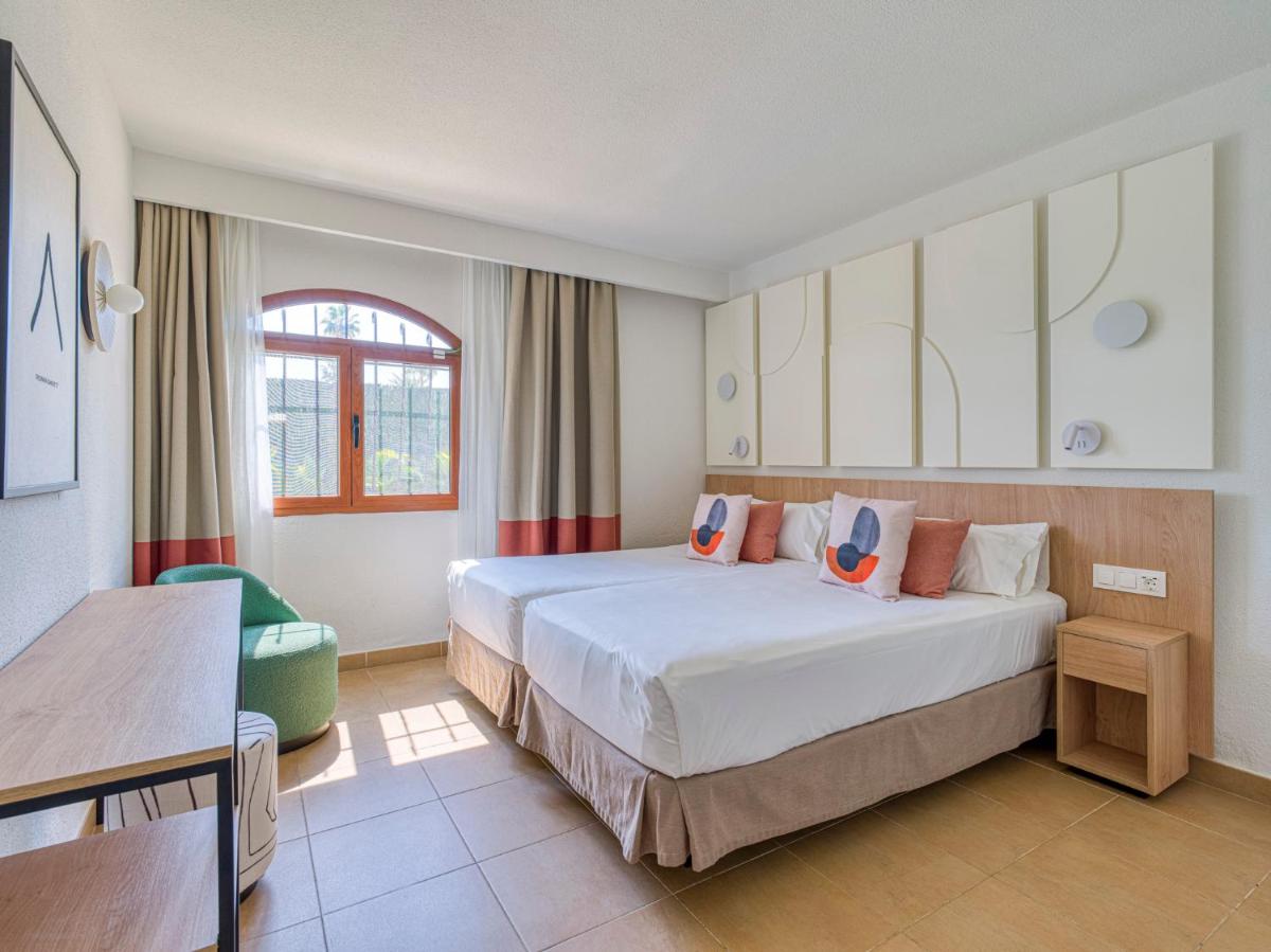 Cama o camas de una habitación en HD Parque Cristobal Gran Canaria