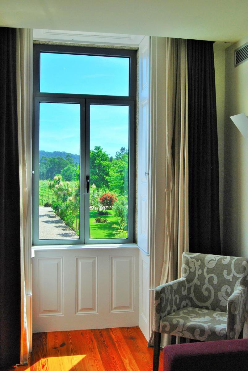 Uma área de estar em Hotel Quinta da Cruz & SPA