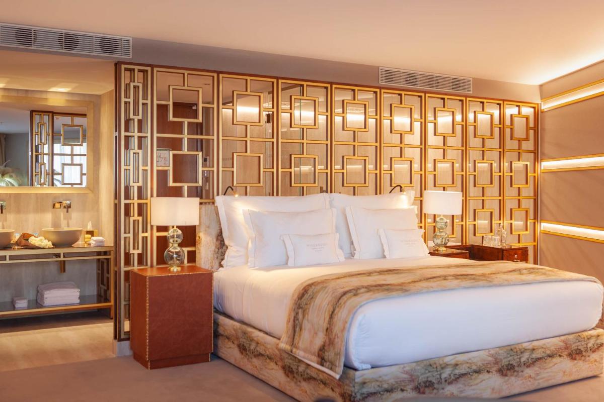 Uma cama ou camas num quarto em Wine & Books Lisboa Hotel