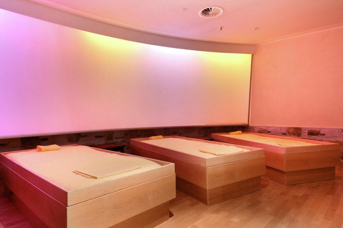 Ein Bett oder Betten in einem Zimmer der Unterkunft Hilton Berlin