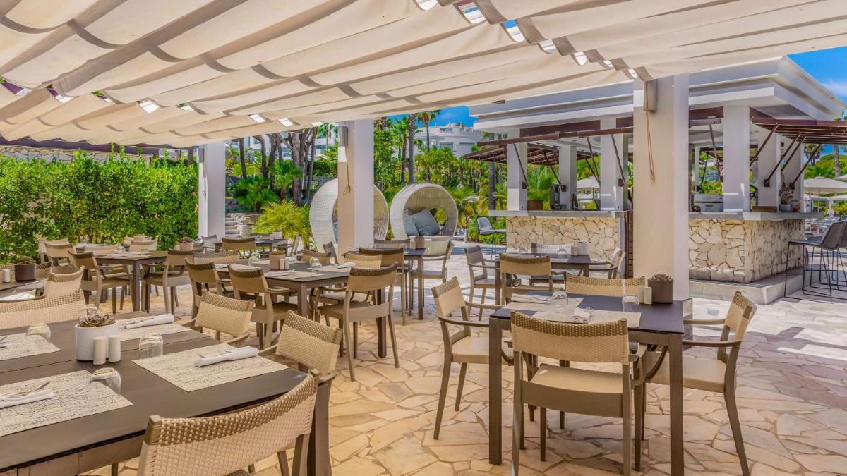 Um restaurante ou outro lugar para comer em Conrad Algarve