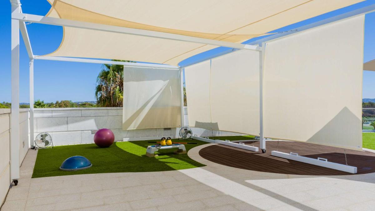 Um jardim no exterior de Conrad Algarve
