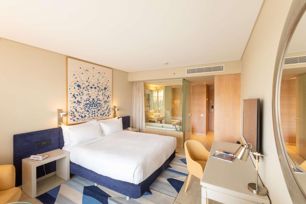 Uma cama ou camas num quarto em Hilton Vilamoura