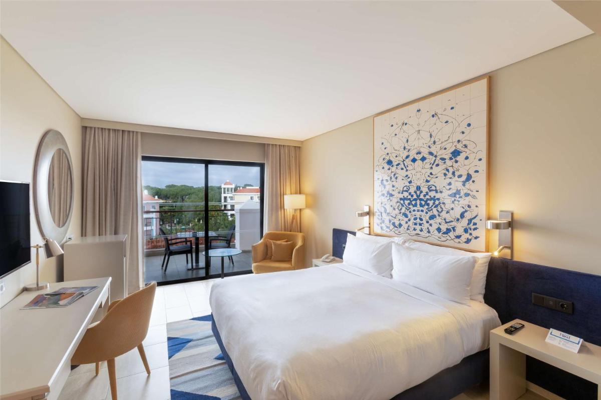 Uma cama ou camas num quarto em Hilton Vilamoura