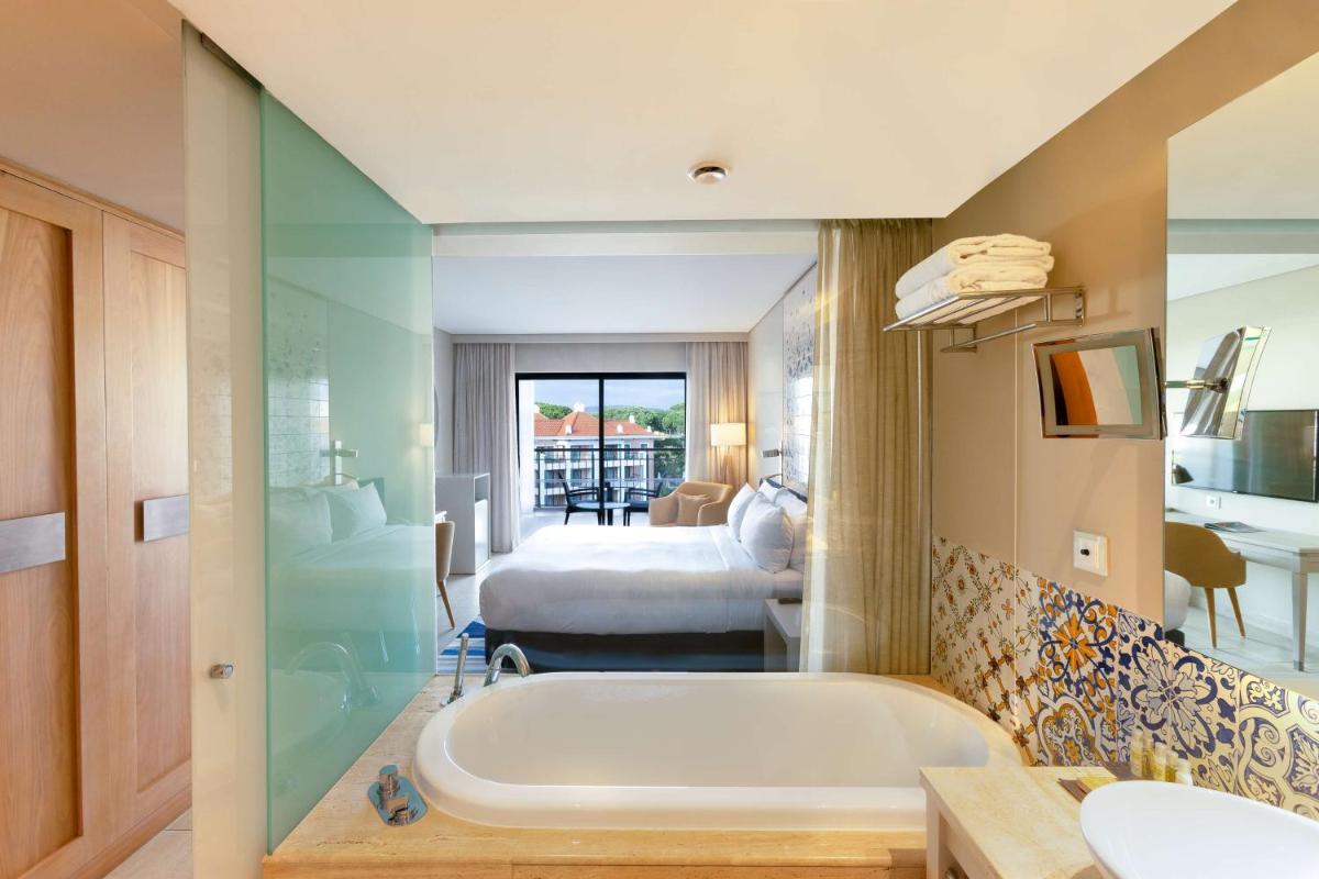 Uma cama ou camas num quarto em Hilton Vilamoura