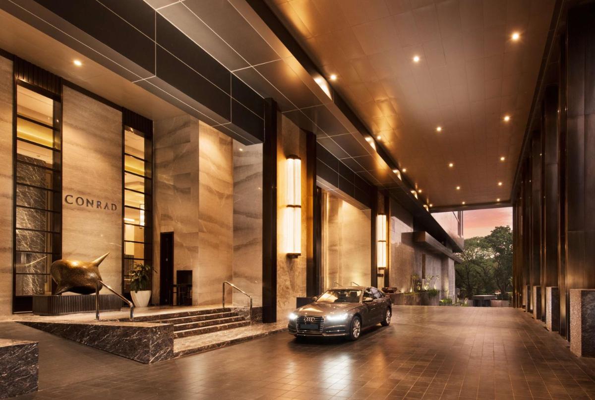 a car parked in front of a building at Conrad Pune in Pune