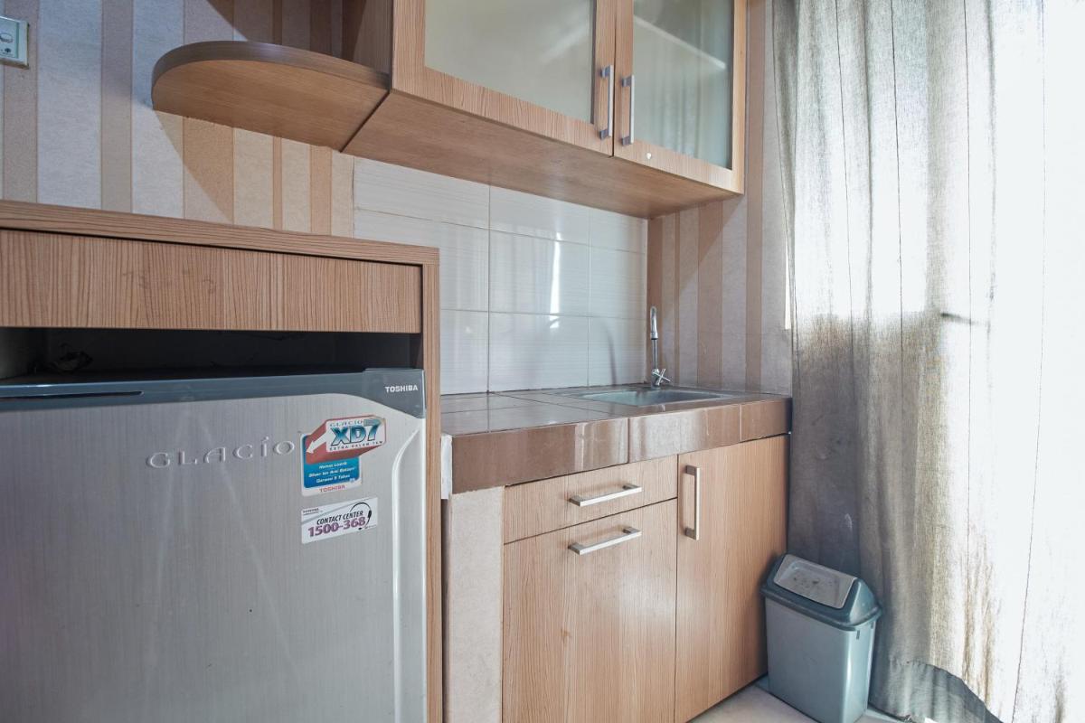 Apartment Green Lake View Ciputat by Celebrity Room - Housity
