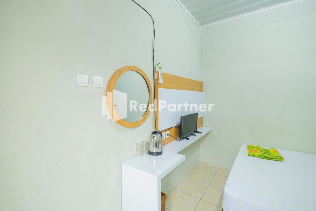 Atiq Homestay Syariah Mitra RedDoorz - Housity