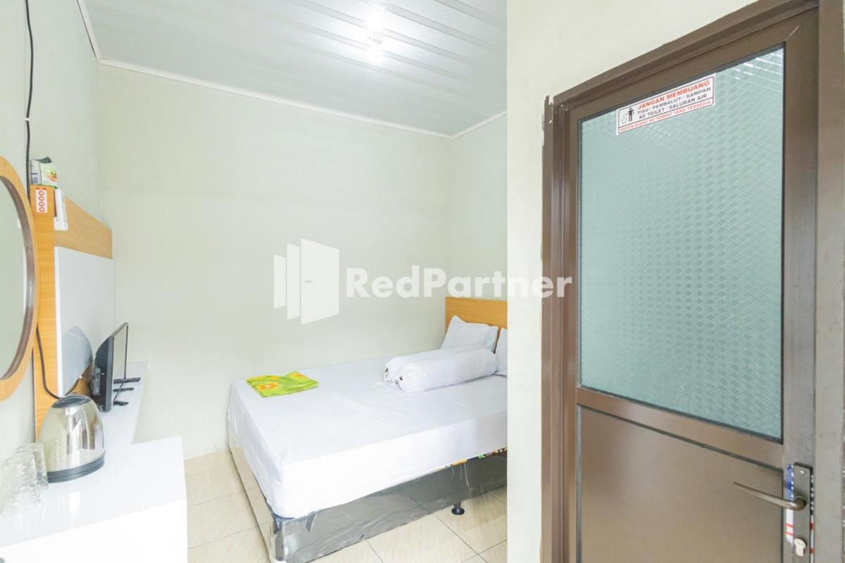 Atiq Homestay Syariah Mitra RedDoorz - Housity
