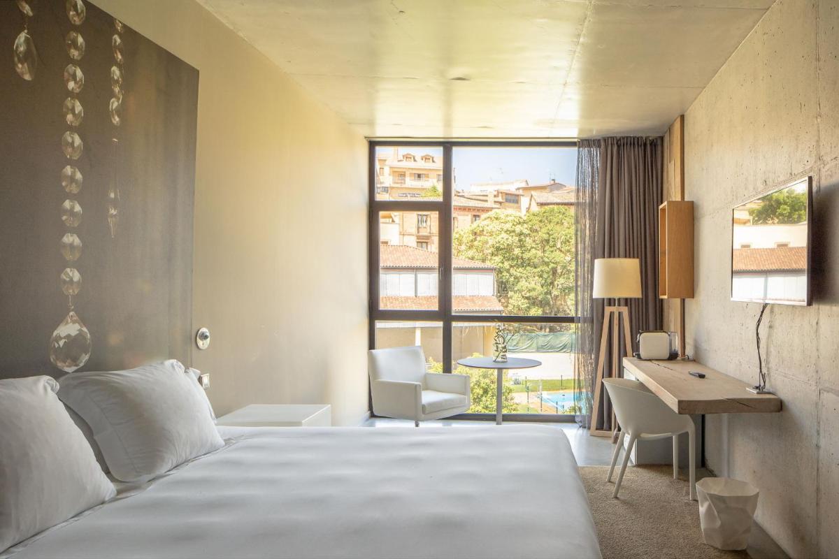 Cama o camas de una habitación en Hotel Viura