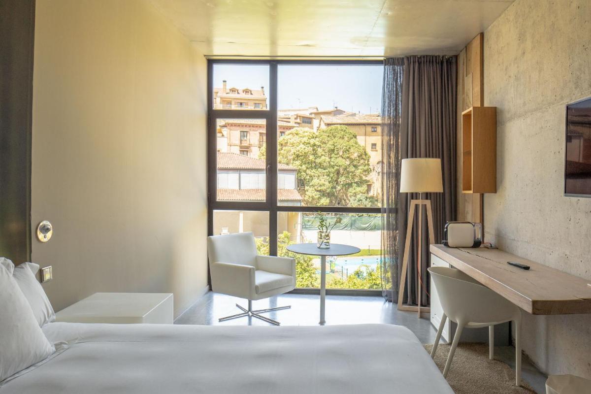 Cama o camas de una habitación en Hotel Viura