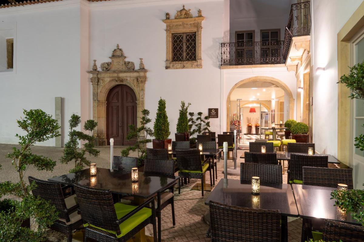Um restaurante ou outro lugar para comer em Vila Gale Collection Tomar