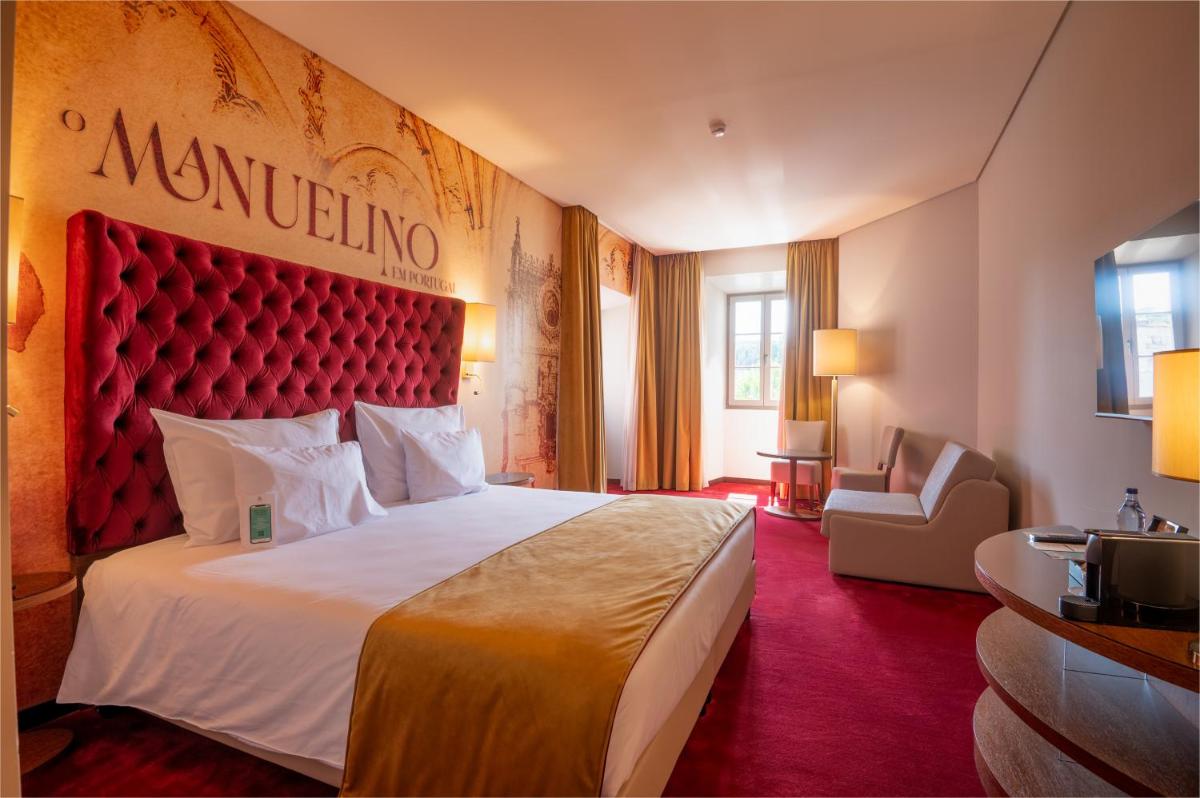 Uma cama ou camas num quarto em Vila Gale Collection Tomar