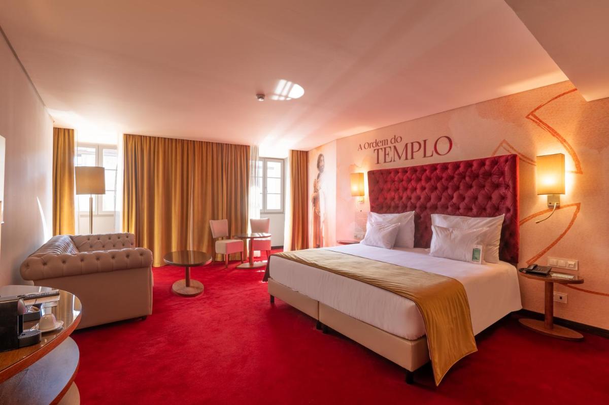Uma cama ou camas num quarto em Vila Gale Collection Tomar