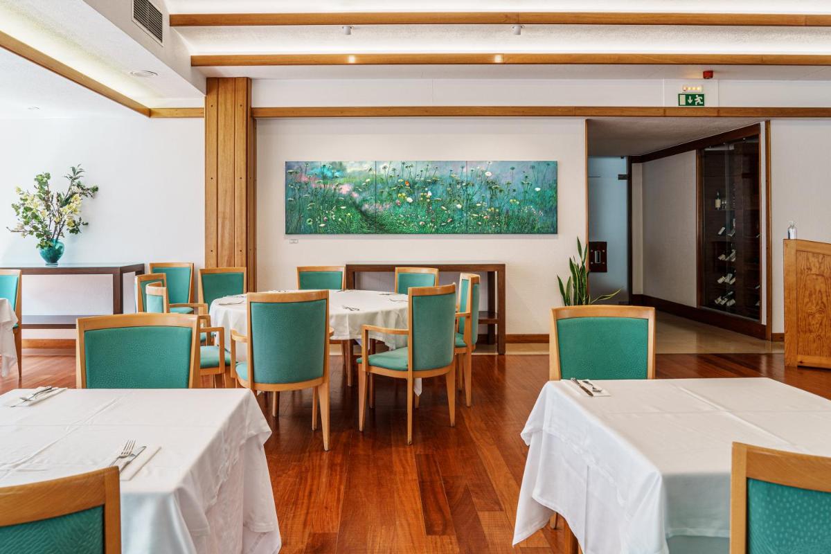 Uma área de estar em Hotel Dom Goncalo & Spa